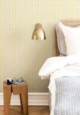 Petit Vichy wallpaper in Jaune in a bedroom