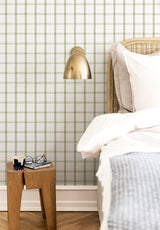 Quadrille wallpaper in Vert Olive in a bedroom