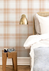 Tartan wallpaper in Terracotta Doux in a bedroom